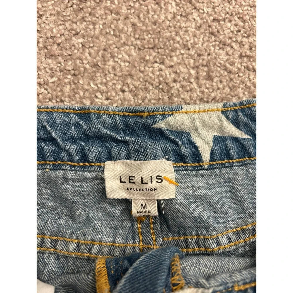 Le Lis Star Print Denim Mini Skirt Womens Medium Blue Excellent Full Zip Raw Hem